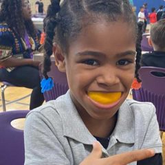 smiling girl with orange peel