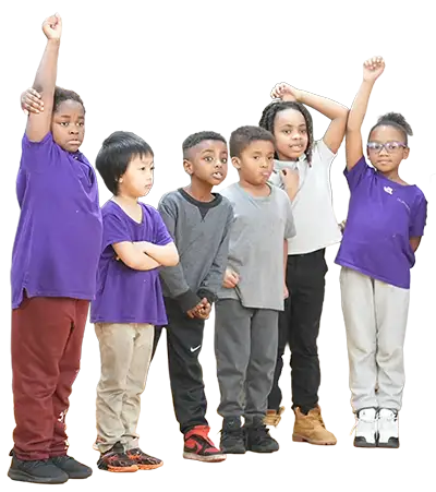 kids with their hands raised